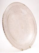 A sterling silver dish, stamped Towle, Sterling, 144: of plain circular form with a spiral edge,