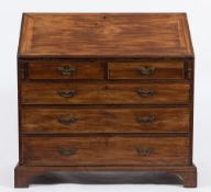 A George III mahogany bureau:,