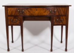 A George IV mahogany and inlaid serpentine fronted side or dressing table:,
