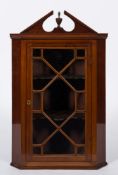 A 19th Century mahogany and inlaid hanging corner display cabinet:,