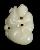 A Chinese carved white jade pendant: in the form of a boy seated on and clasping a giant gourd,