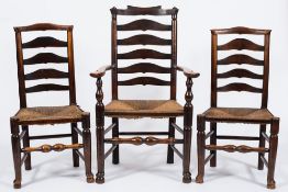 A harlequin set of eight early 19th Century elm, ash and beech curved ladderback dining chairs:,