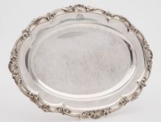 A George IV silver serving dish, maker William Kerr Read, London 1827: crested to border,