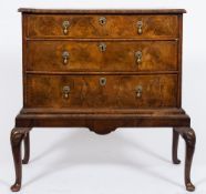 An 18th Century walnut chest of small size on later stand:,