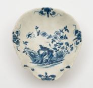 A Worcester blue and white shell-shaped pickle dish: painted with 'The Two-Peony Rock Bird' pattern