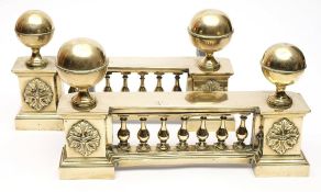 A pair of 19th century brass andirons: of baluster galleried form with cup and ball finial's,