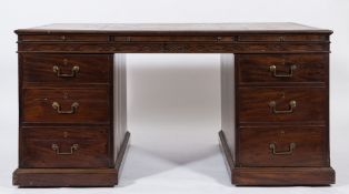 An early 19th Century partner's mahogany kneehole desk:,