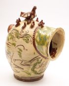 A dated Staffordshire pottery salt pig: of traditional form surmounted with a mother hen and chicks