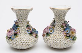 A pair of Jacob Petit Schneeballen vases: each of squat form with raised flaring neck,