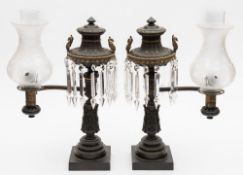 A pair of American parcel-gilt bronze whale oil Argand lamps and shades: retailed by Baldwin