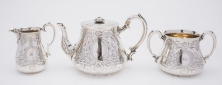 A Victorian silver presentation three-piece tea service, maker Robert Harper, London,