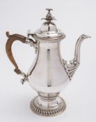 An early George III silver coffee pot, maker W.