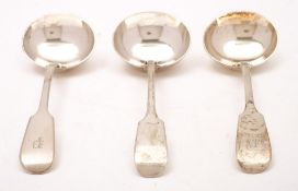 A pair of Victorian Exeter silver Fiddle pattern sauce ladles, maker John Stone,