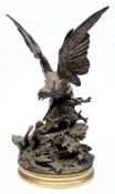 After Alphonse Arson (1822-1882) a bronze study of an eagle: attacking a birds nest on a rocky