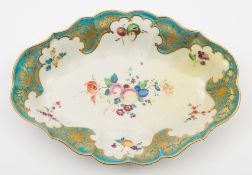 A Worcester lozenge shaped dish: painted in the workshops of James Giles with bunches of fruit and
