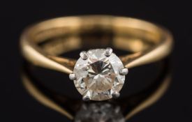 An 18ct gold and diamond single-stone ring: with circular brilliant-cut stone approximately 6.