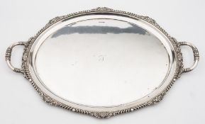 A George V silver tea tray, maker Walker & Hall, Sheffield, 1929: initialled, of oval outline,