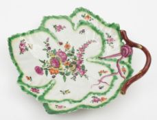 A Worcester dessert leaf dish: in the form of overlapping green edged vine leaves with puce stems