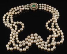 A graduated cultured pearl three-string necklace: the strings composed of 57,