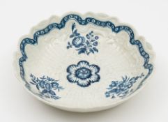A Worcester blue and white junket dish: moulded with foliage and trellis,