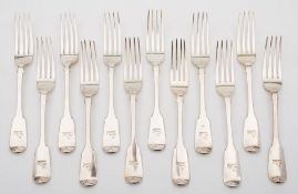 A set of eleven Victorian silver Fiddle pattern table forks, maker George Adams, London,