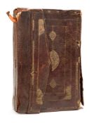 KORAN / HOLY BOOK : Illuminated manuscript, mainly in written in black, red and bordered in blue,