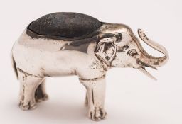 An Edward VII silver novelty pin cushion in the form of an elephant, maker's mark worn, Birmingham,