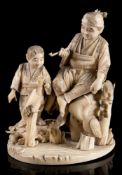 A Japanese carved ivory sectional okimono of a fisherman and child: beside a river looking after