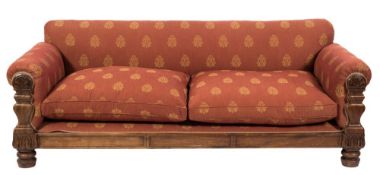 A 19th Century French carved mahogany settee:, with a rectangular upholstered stuff over back,