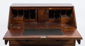 A George III mahogany bureau:,