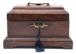 A Georgian mahogany tea caddy: of rectangular outline, with shallow domed hinged lid,