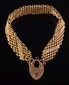 A 9ct gold mesh-link bracelet: with 9ct gold padlock clasp, approximately 19cm long, 27.