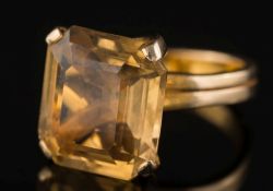 An octagonal citrine single-stone dress ring: the octagonal citrine approximately 15mm long x 13.