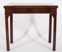 A George III mahogany card table:,