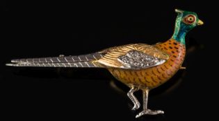 An enamelled gold and rose diamond 'pheasant' brooch: 25mm long x 13mm wide, 1.7gms gross weight.