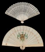 A 19th century Chinese bone brise fan: with pierced stick and guards, 21cm.