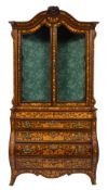 A late 18th/early 19th century Dutch rosewood and floral marquetry bombé display cabinet: bordered