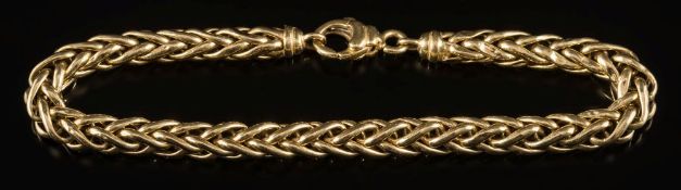 A late 20th century 18ct gold spiga design bracelet:, 21.5cm total length, 16.5gms gross weight.