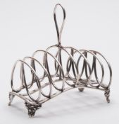 A Victorian silver six division toast rack, maker John Evans II, London,