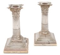 A pair of Edward VII silver desk candlesticks, maker William Hutton & Sons Ltd, London,