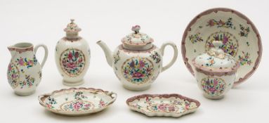 A First Period Worcester part tea service: decorated in the Chinese export style in famille rose
