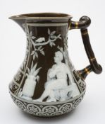A pate sur pate decorated jug, probably George Jones: in the manner of Schenck,