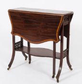 An Edwardian mahogany and inlaid Sutherland table:,