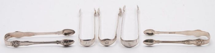 A pair of Victorian silver sugar tongs, maker William Theobald, London, 1837: with shell decoration,