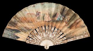 A 19th century bone and gilt decorated fan: the paper leaf decorated to one side with young lovers