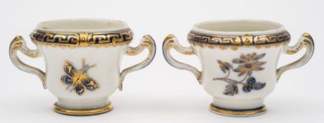 A pair of Tournai miniature two-handled vases: of ogee form with scroll handles,