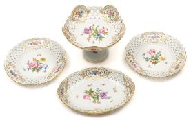 A Meissen part dessert service: with pierced basket pattern rims,