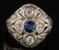 A sapphire and diamond domed cluster ring: the central,