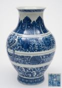 A Chinese blue and white baluster vase, Hu: with mythical beast mask and ring handles,