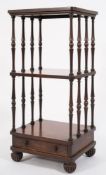 An early 19th Century mahogany three-tier whatnot:,